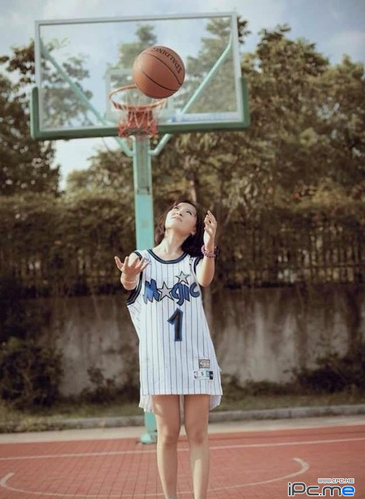 girl wearing basketball jersey